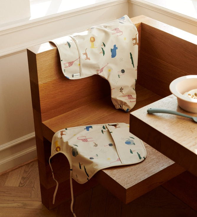 Nepromokavý bryndák LIEWOOD Lai Safari / Sandy | Lavly.cz