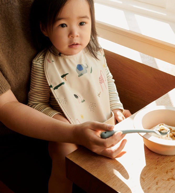 Nepromokavý bryndák LIEWOOD Lai Safari / Sandy | Lavly.cz