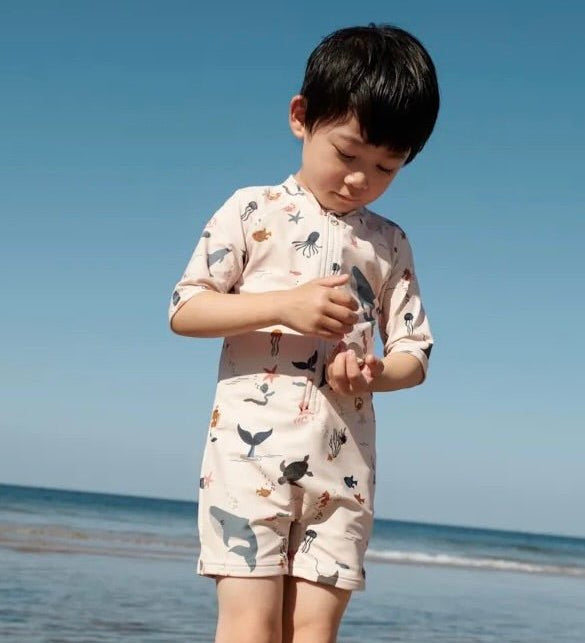 Plavkový overal SPF40 LIEWOOD Max Mořský svět / Sandy | Stylové doplňky pro děti a ženy | Lavly.cz
