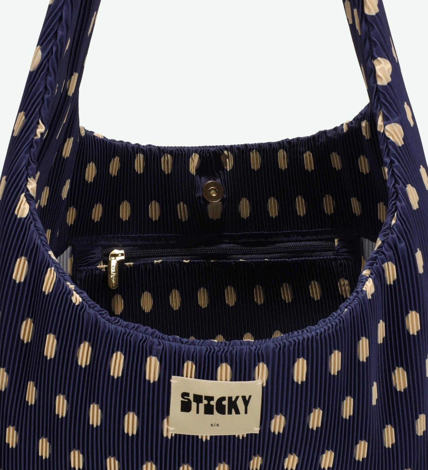 Plisovaná taška THE STICKY SIS CLUB Dots Marine + Marzipan | Lavly.cz