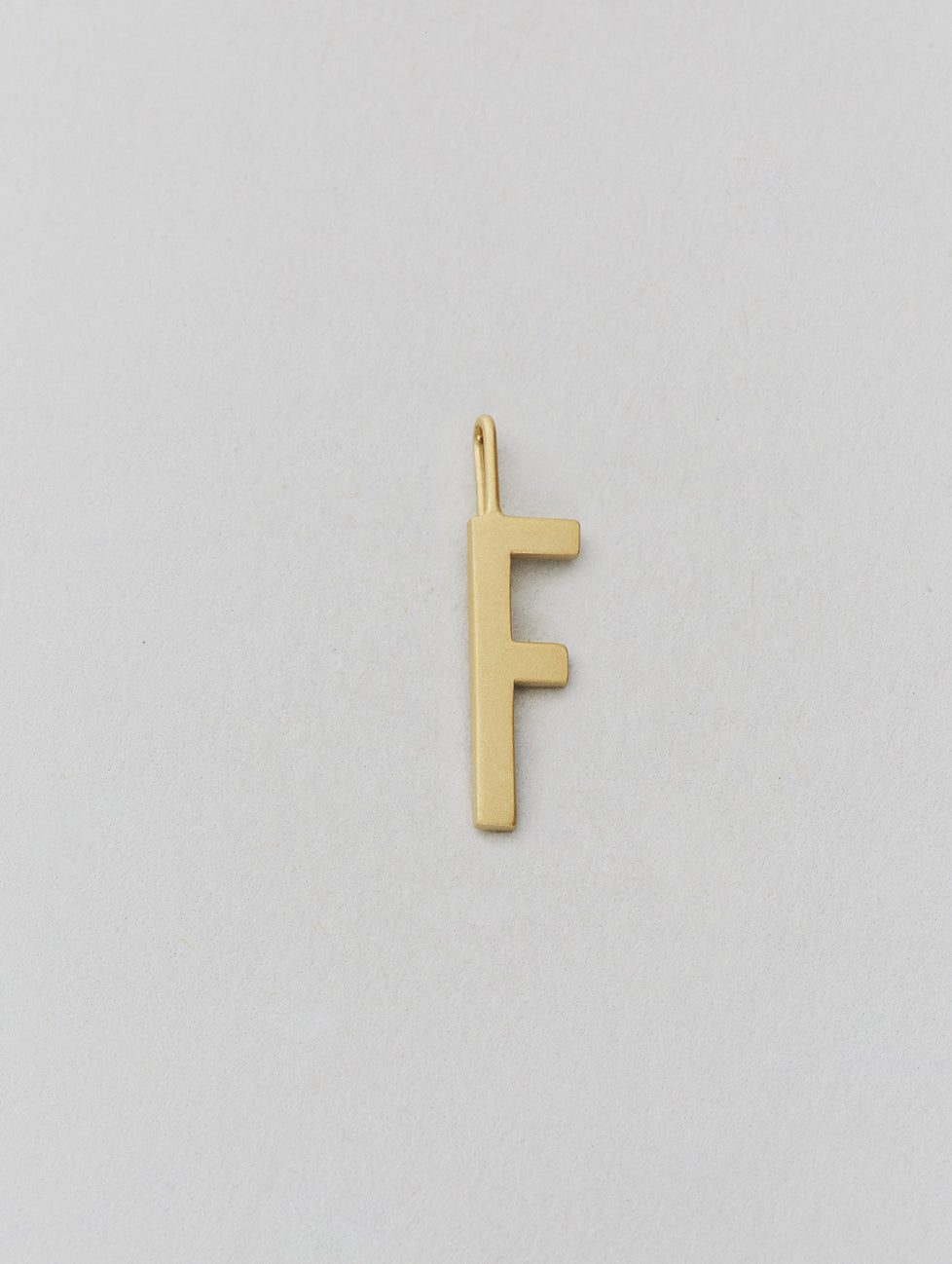 Zlatý přívěsek Písmeno A-Z - 16 mm DESIGN LETTERS - Lavly